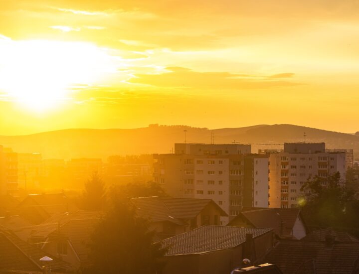 bright sun over a city