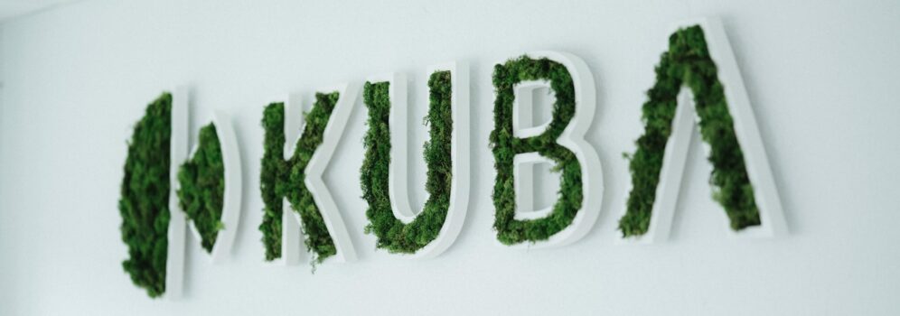 Kuba logo with living plants spelling out the letters